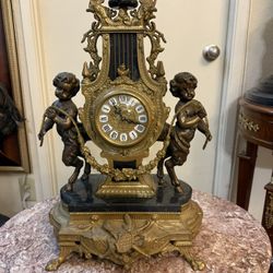French Rococo Style Figural Mantel Clock . Italy Late 20 Century 