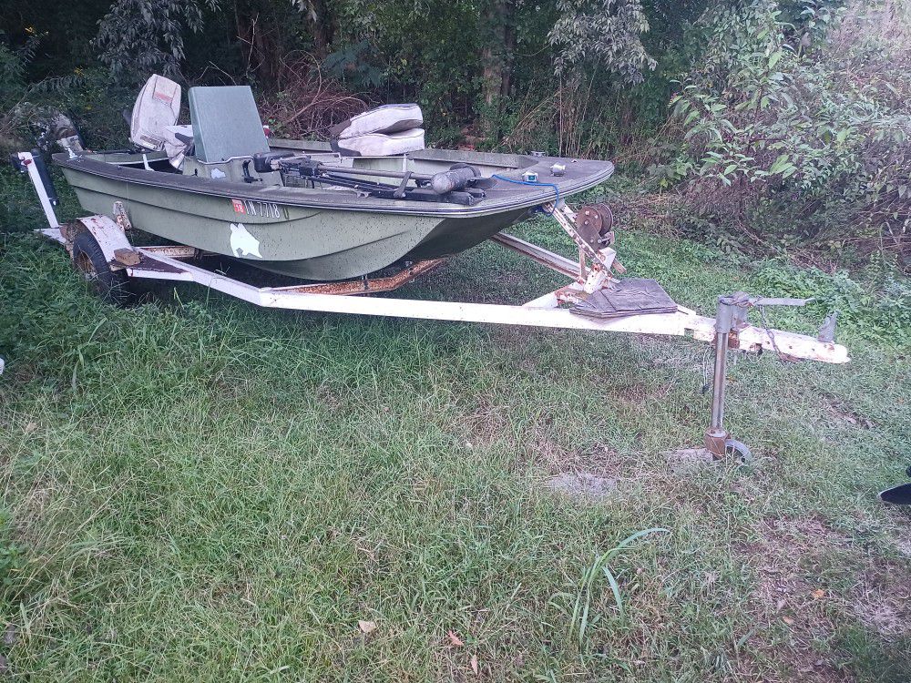 Boat And Trailer With Motor 
