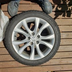 4 Michelin 17"  Ice X tires mounted on Mazda 3 Wheels