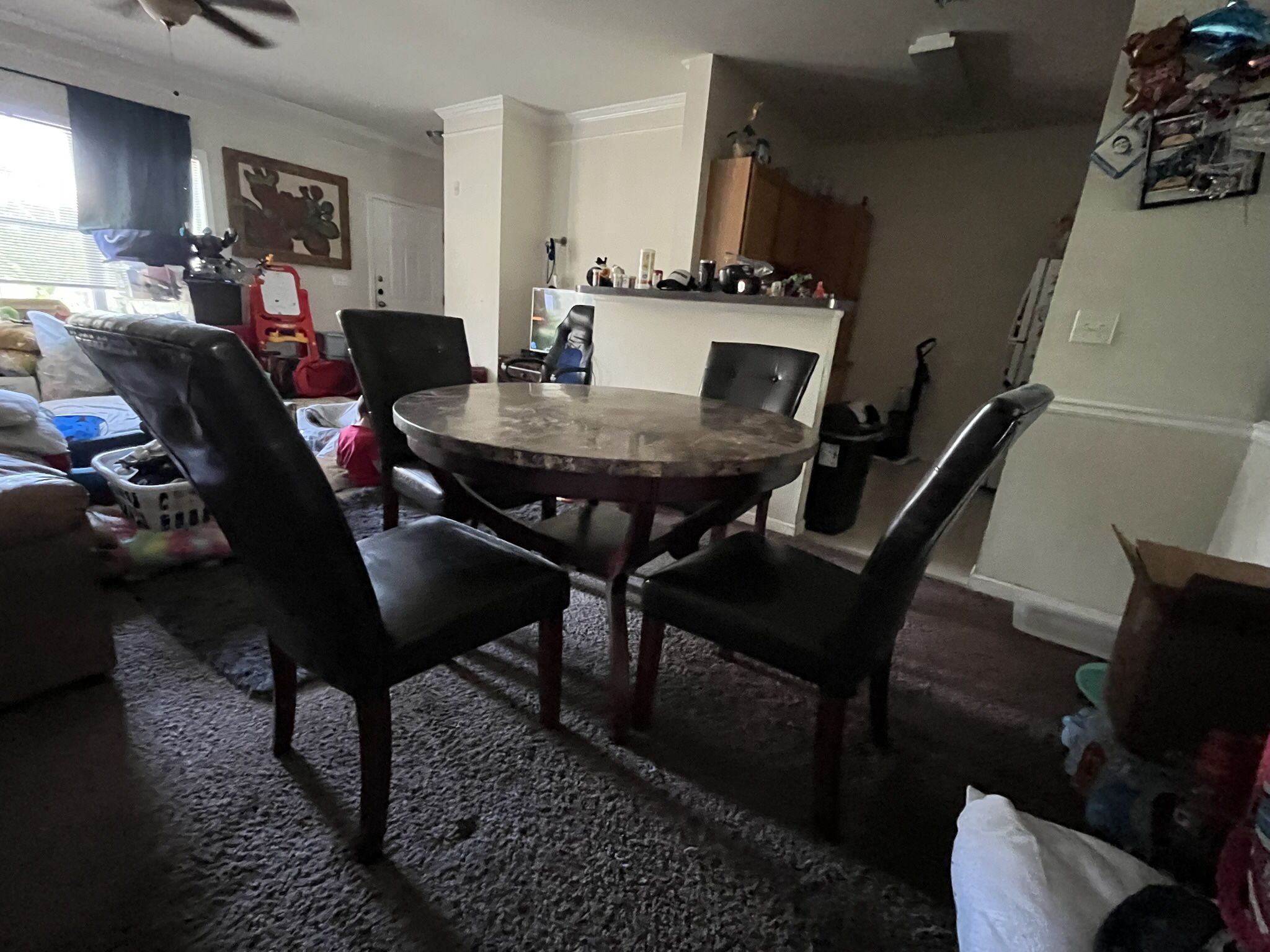 Table and 4 Leather Chairs