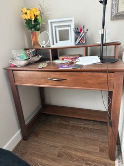 Wooden work desk with drawer and shelves