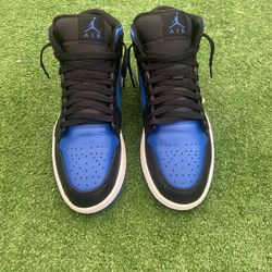 black and royal blue Air Jordan 1s