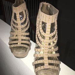 Studded Caged Beige Studded Heals 7 1/2 (zipper has a stain) Available Monday-Friday, No Saturday’s