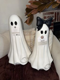 Viral My Texas House ghost pair, one with bow and eyelashes and one without