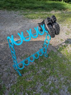 Handmade horseshoe boot rack