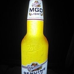 MGD Light Very Sign It's Two Feet Five Inches High And About 7 In Wide Very Nice Beer Sign Rare Lights Up Looks Real When Lit Up.