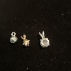 2 Clear Stone And 1 Amethyst Pendants