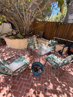 Outdoor patio set and Glass Table.