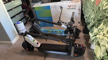 2 NIU electric scooters