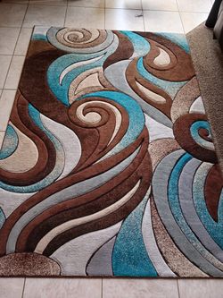 Brown and Teal Swirl Area Rug