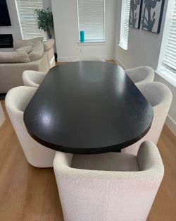 Modern Black Oval Dining Set with 6 Cream Bouclé Chairs