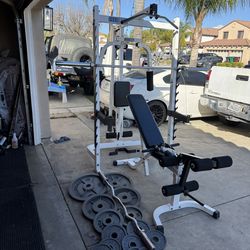 Para body commercial squat rack/bench press with pulleys system and 7ft 45lbs bar plus 255lbs of Olympic weights and curl bar