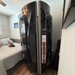 Oasis Standing Tanning Bed