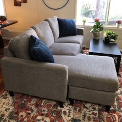 Living Spaces 80” by 60” Sectional Sofa with Reversible Chaise