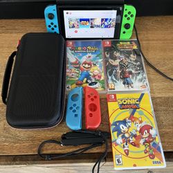 Nintendo Switch System Console w/ Dock, 3 Games, And more Extras