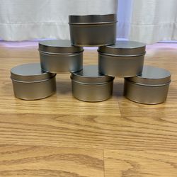 24 empty tins ready for you to fill with you beauty potions, candles, and other small items