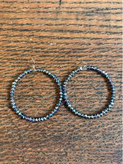 Beautiful blue iridescent circle earrings