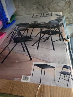 Fold Black  Table with 4 chairs.