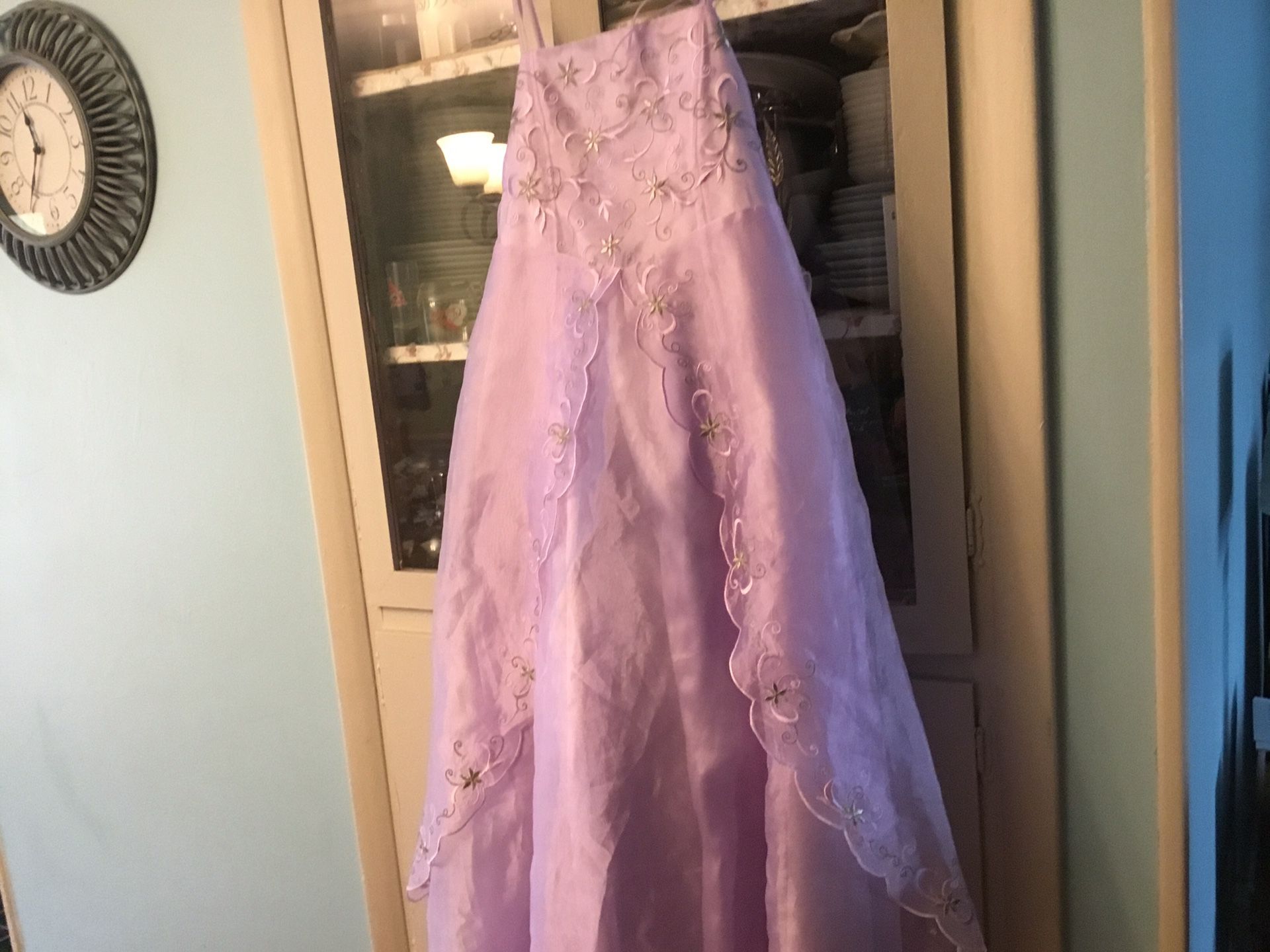 Girls size 14 Easter dresses 9$ each one lilac and one ivory