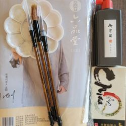 Raw xuan paper, Chinese calligraphy brushes, paints, and ink