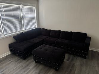 Black L-Shaped Sectional + Ottoman