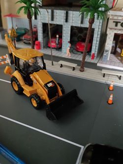 Cat backhoe 1/64 scale diecast