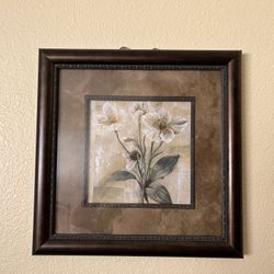 Set of two identically framed paintings of white flowers