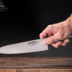 Elevate your cooking game with this authentic Global GSF-22 Utility Knife, crafted in Japan for professional-grade performance. This versatile 4.25-in