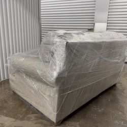 Beige loveseat in excellent condition - barely used! $300 OBO