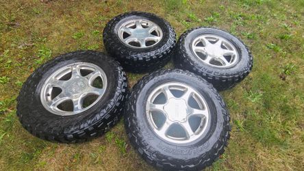 265 70 17 Studded Off Road Tires on GMC Wheels