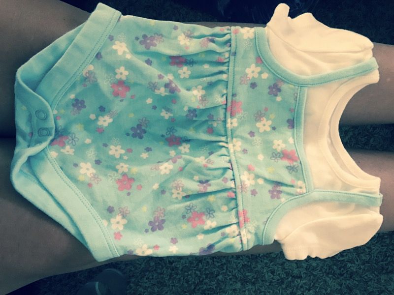 Brand new never worn 0-3mths onesie