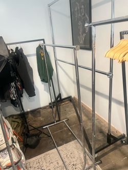 4 Rolling Clothes Racks + 1 clothing rack