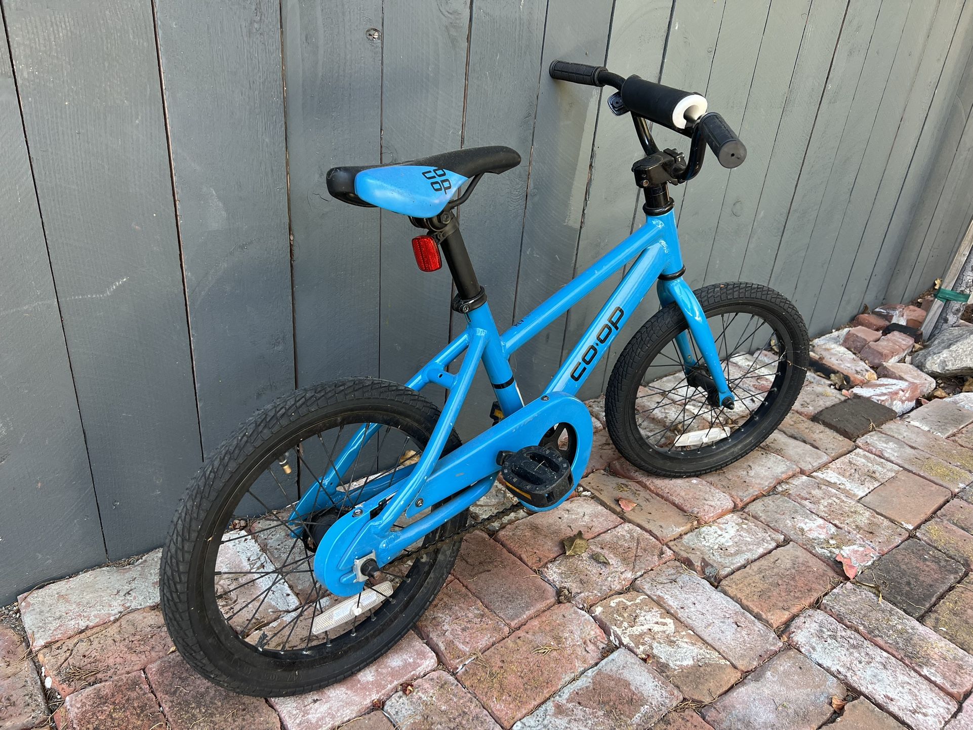 bedbathand beyond patio umbrellas Used REI Coop 16" Kid's Bike Coco's Variety with removable training wheels and a low stand Mountain Bike Rei Co Op