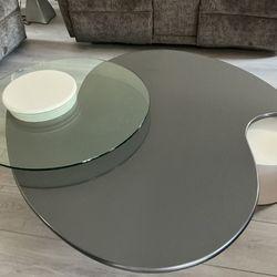 Multi-level comtemporary coffee table with swivel glass