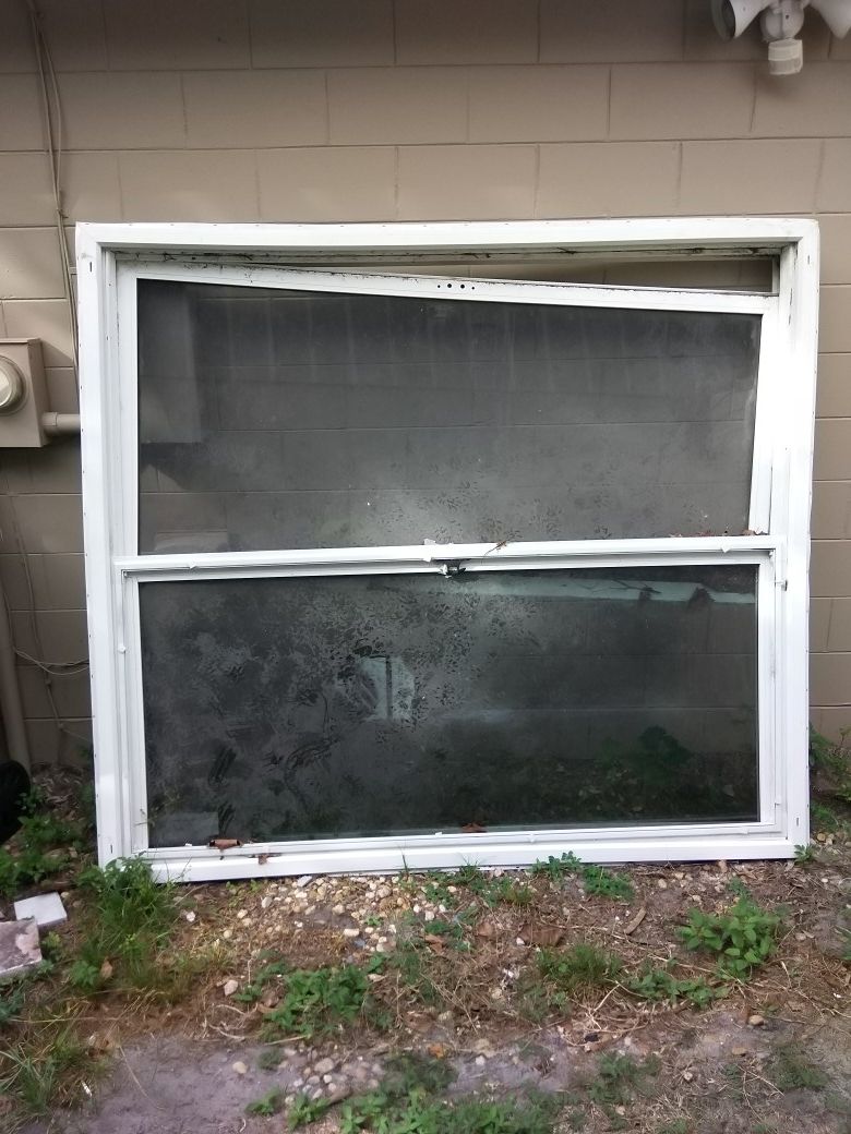 sliding door for patios FREE. Size: 82 inch x 74 inch. The door is new, it is double glazed but one of the glass is broken.