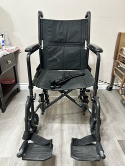 Black Folding Transport Wheelchair