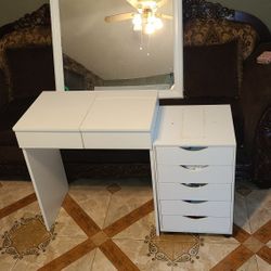 Vanity with large mirror and dresser—in excellent condition.