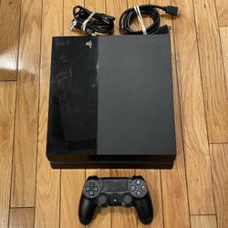 Sony PlayStation 4 500GB Game Console with GTA V and The Last of