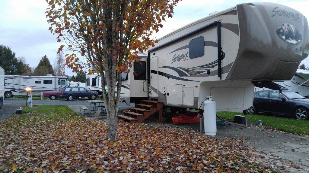 2015 Forest River Silverback 5th Wheel, Model 33IK, 36 ft. with 3 slide outs.