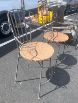 2 metal outdoor chairs
