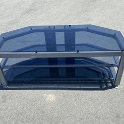 3-tier TV Stand, 60in. Long x 22 in-depth x 23in tall.