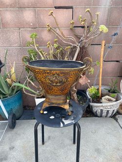Decorative Metal Urn Planter with Crown Emblem