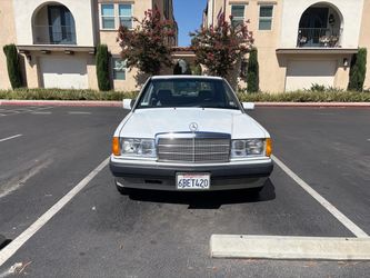 Mercedes-Benz 190E White Sedan