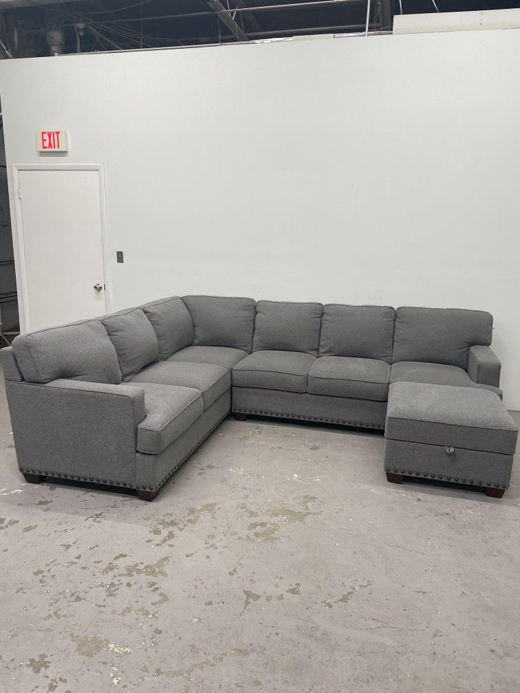 Used Gray Sectional Sofa Couch and Ottoman