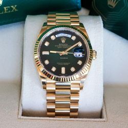 Rolex Day-Date 36
Green Ombré Diamond Dial 128238 LNIB 18k YG 2022 Full Set