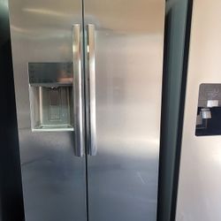 Frigidaire 33" Wide Apartment Size Stainless Steel Side By Side Refrigerator 