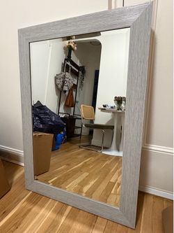 mirror with grey wood frame