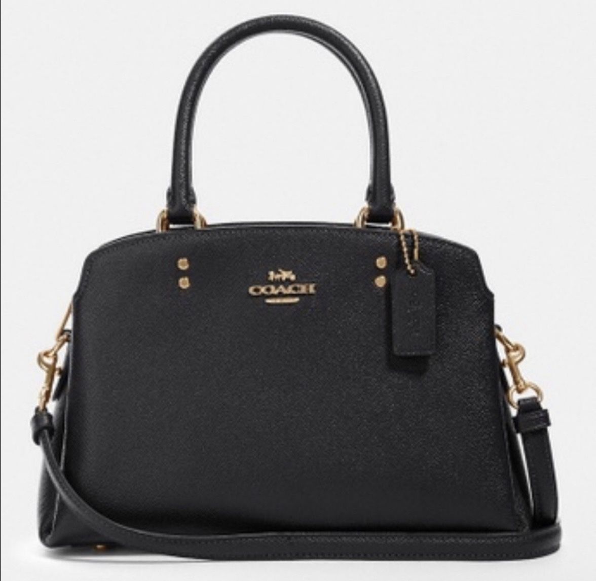 New Rarely Used Lillie Carryall Handbag Crossbody Leather Light Blush Black Coach Medium sized purse with 4 purse pockets 