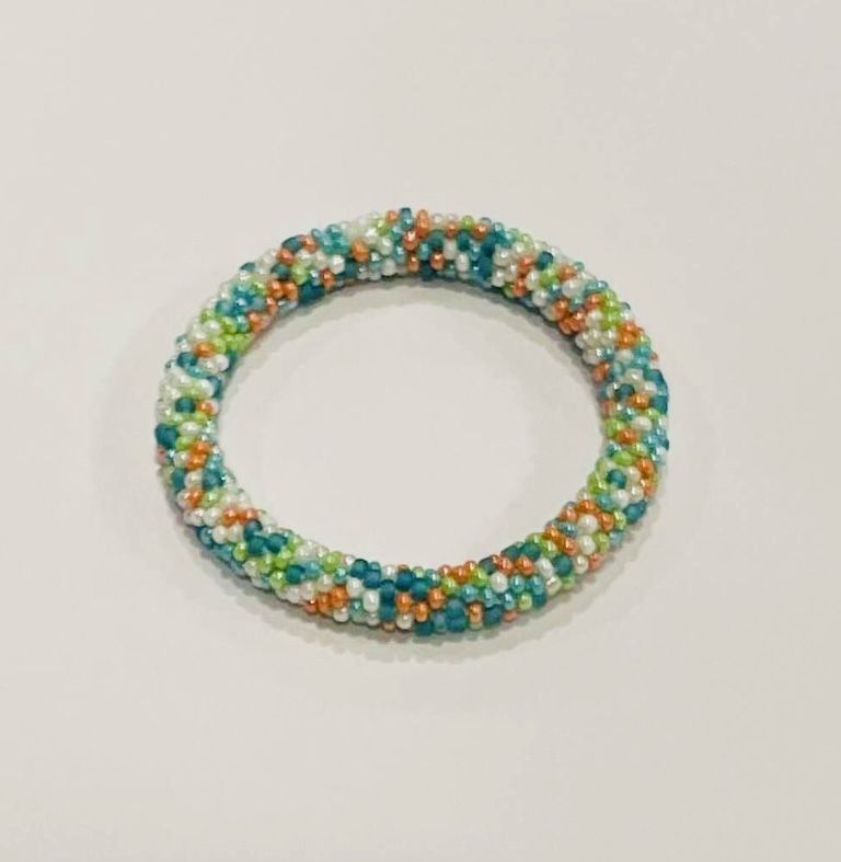$30 Sashka Co Handmade Rolling Baby Bead Bracelet-Like New! Hand crocheted in Nepal