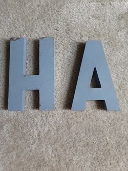 Metal letters H and A
